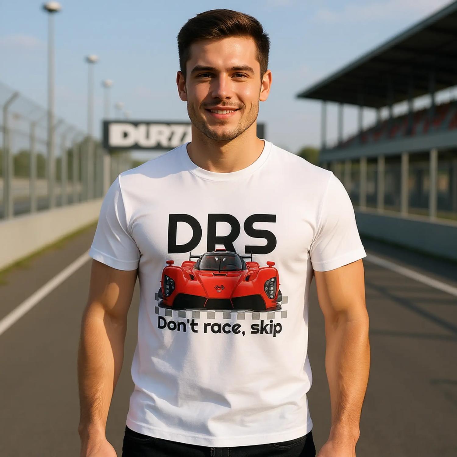 Man wearing a white t-shirt with a red car graphic and text on a race track background