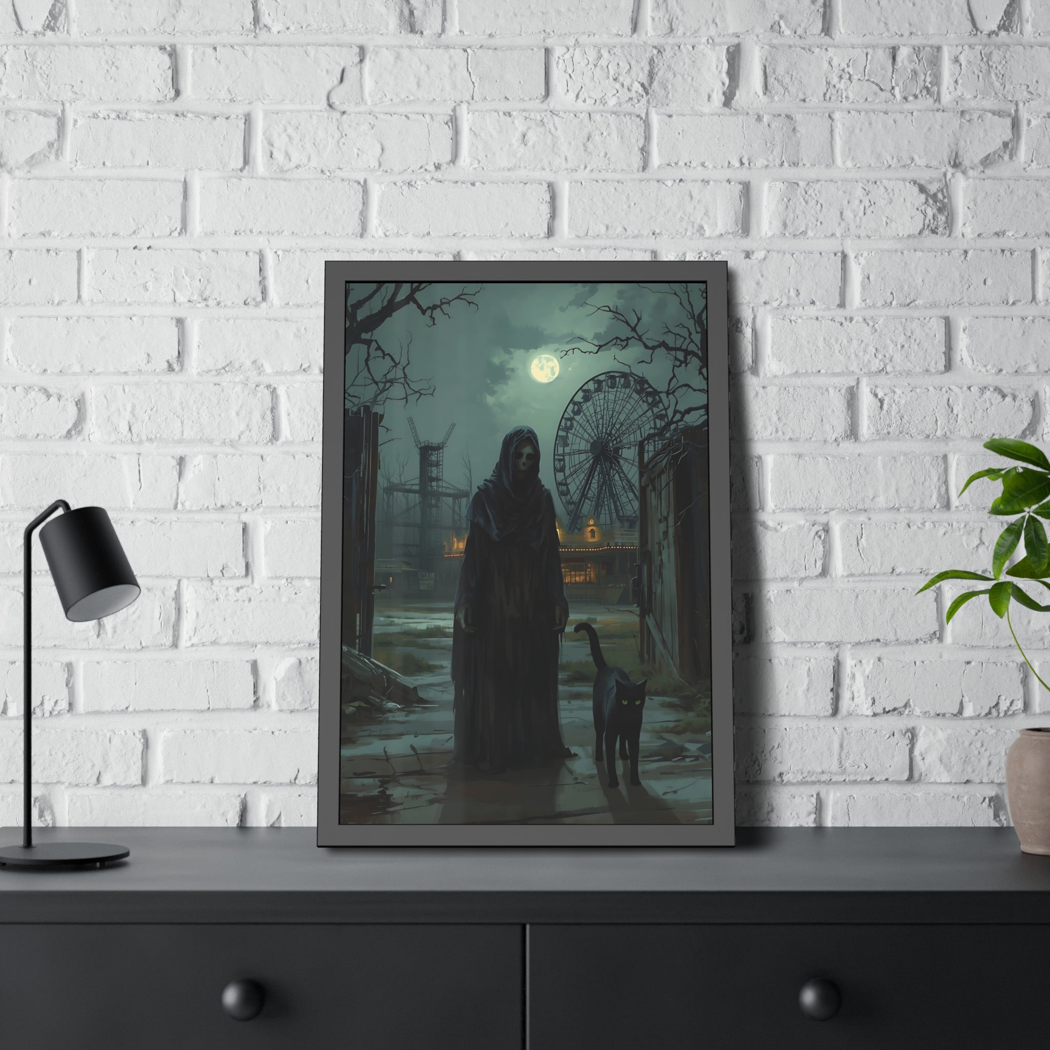 Framed artwork of a dark scene with a figure and cat on a white brick wall background