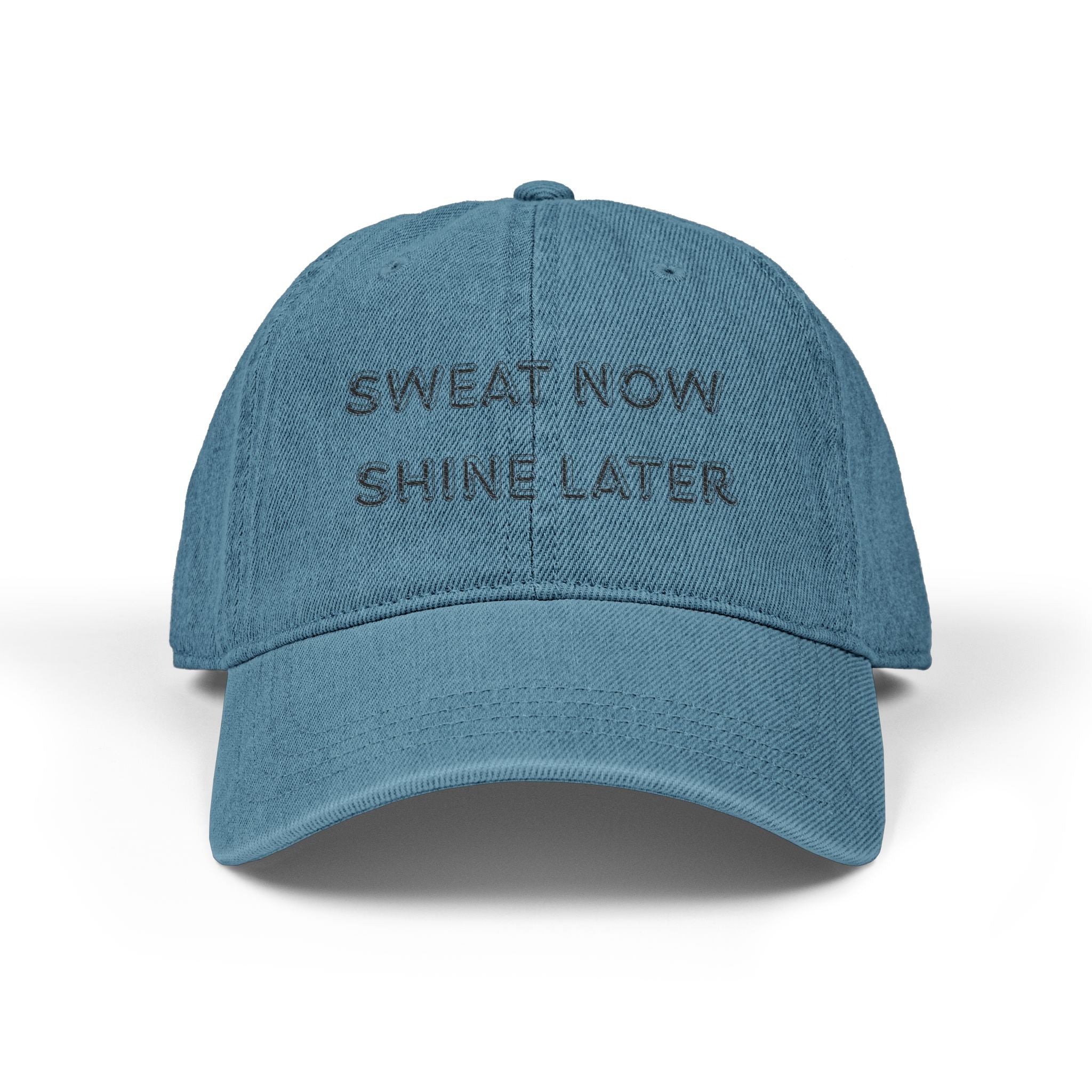 Blue cap with 'Sweat Now Shine Later' text on a white background