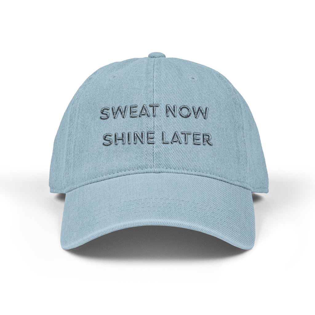 Light blue cap with 'Sweat Now Shine Later' text on a white background