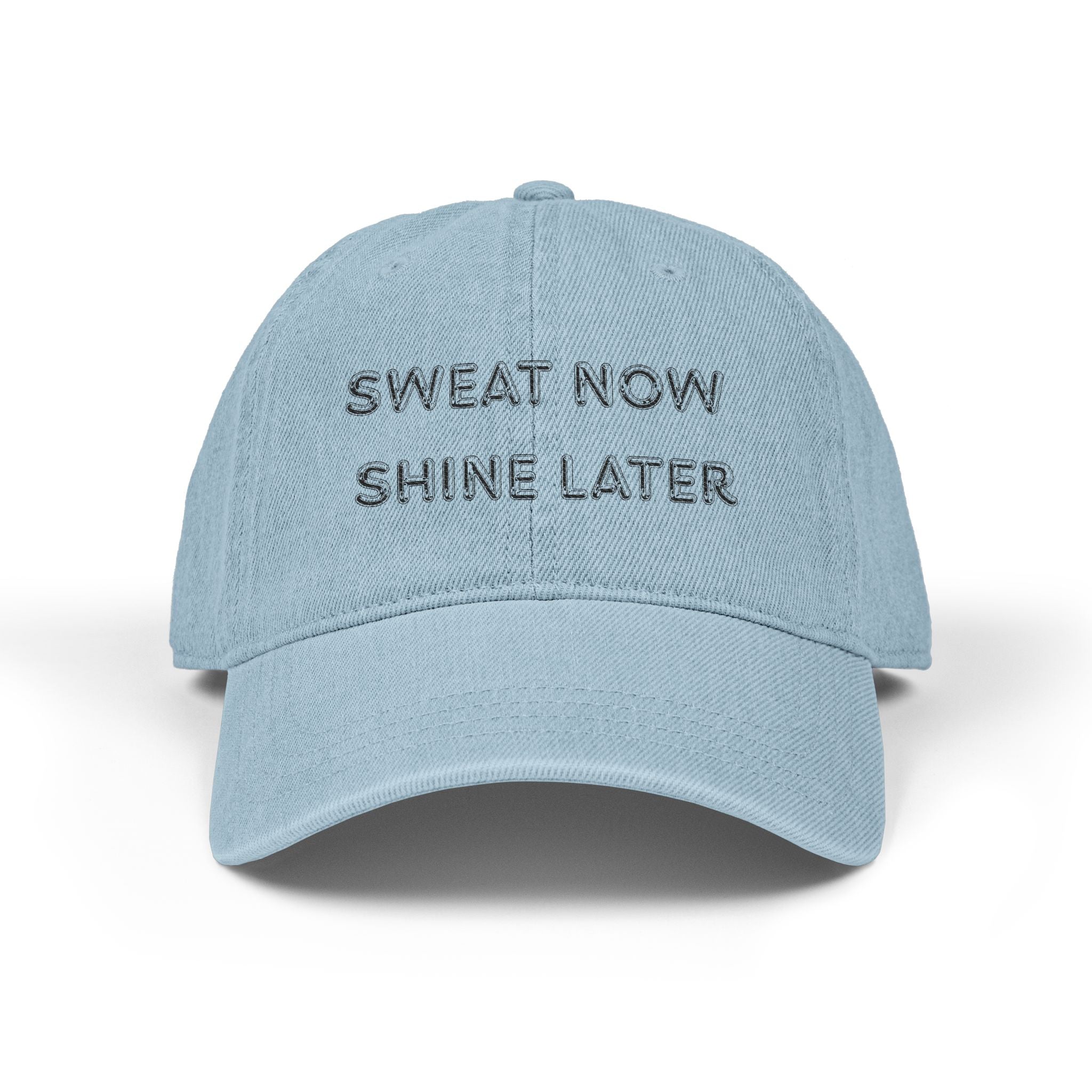 Light blue cap with 'Sweat Now Shine Later' text on a white background